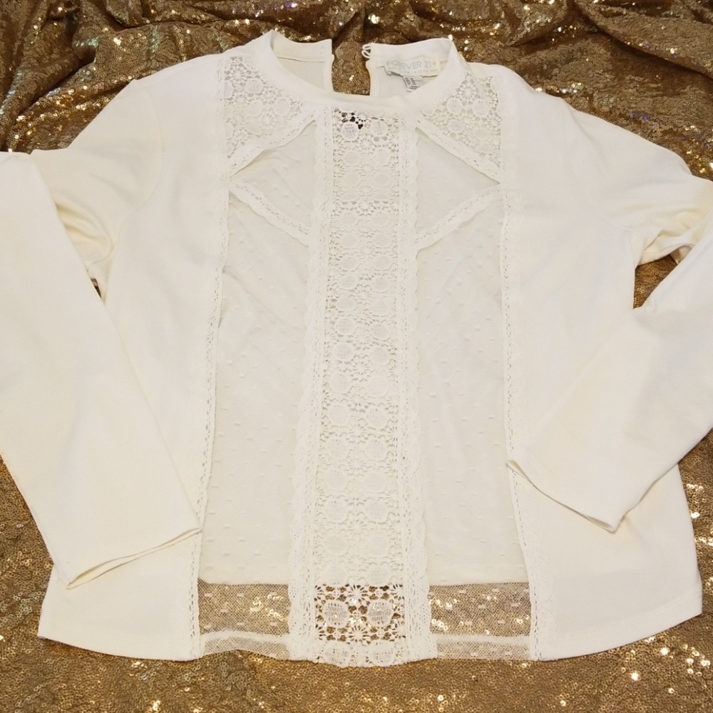 Cream stretchy knit top with sheer chest panel